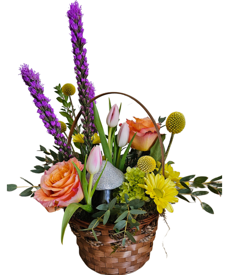 Basket with tulips, liatris, hydrangea, roses, daisies and a glittered mushroom